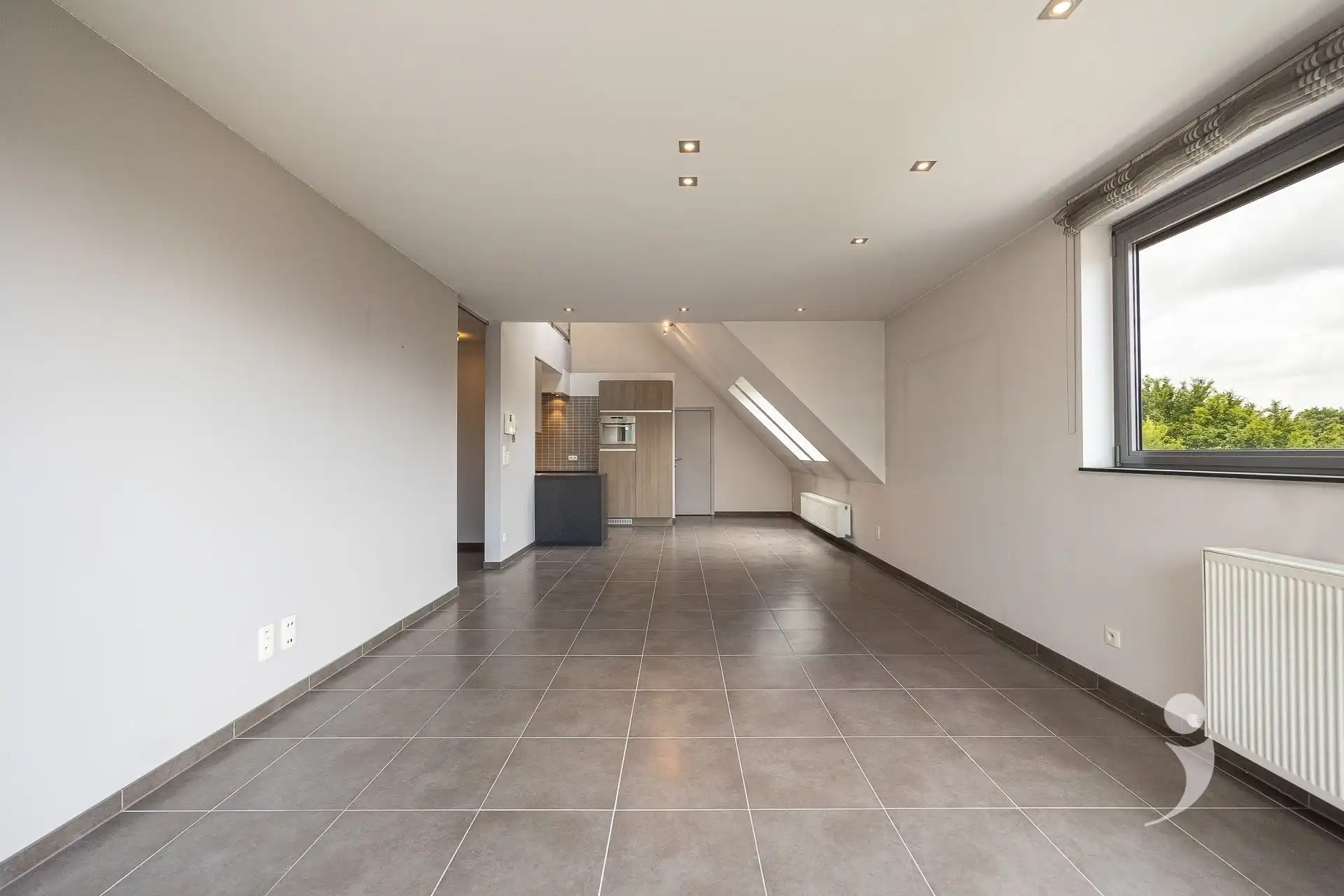 Zeer ruim duplexappartement in hartje Herent! foto {{pictureIndex}}