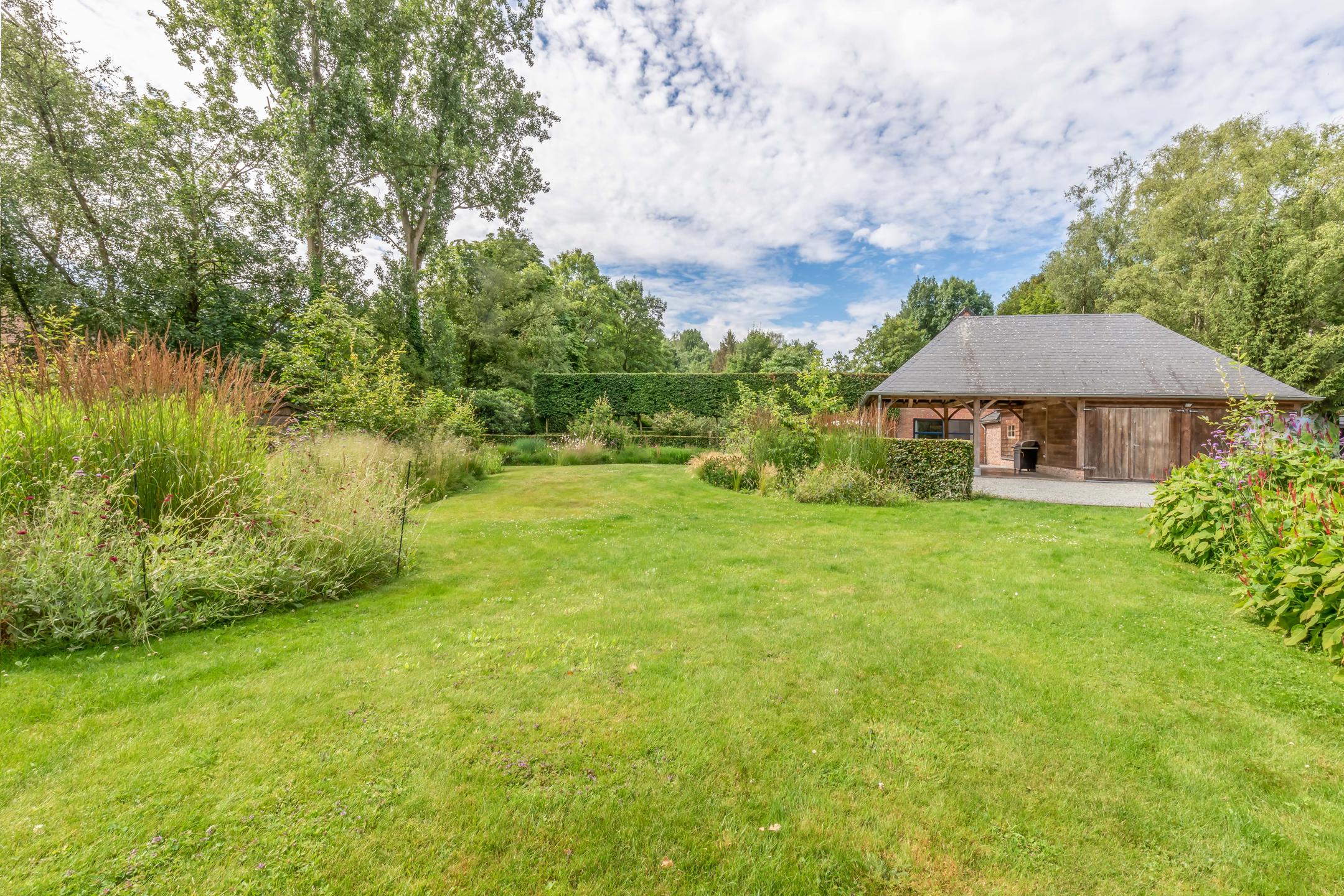 Prachtig perceel van 3348m2 met magnifieke tuin. foto 35