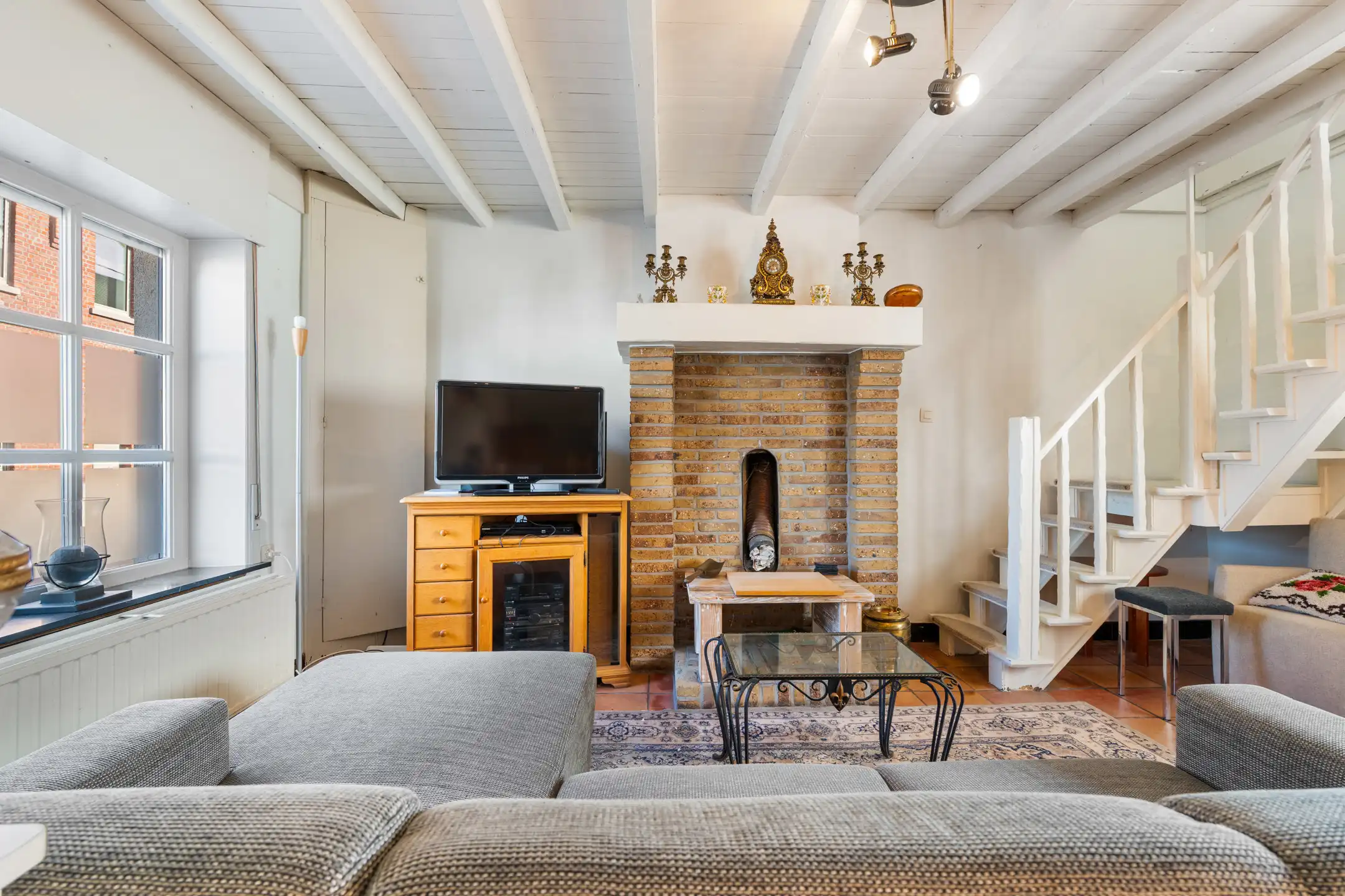 Charmante 3-gevelwoning met garage en tuin foto 10