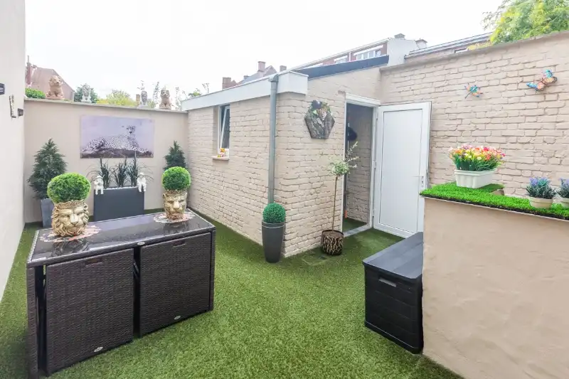 Rustig gelegen woning met 3 slaapkamers en tuinterras op een steenworp van het albertpark en de Leieboorden. foto 12