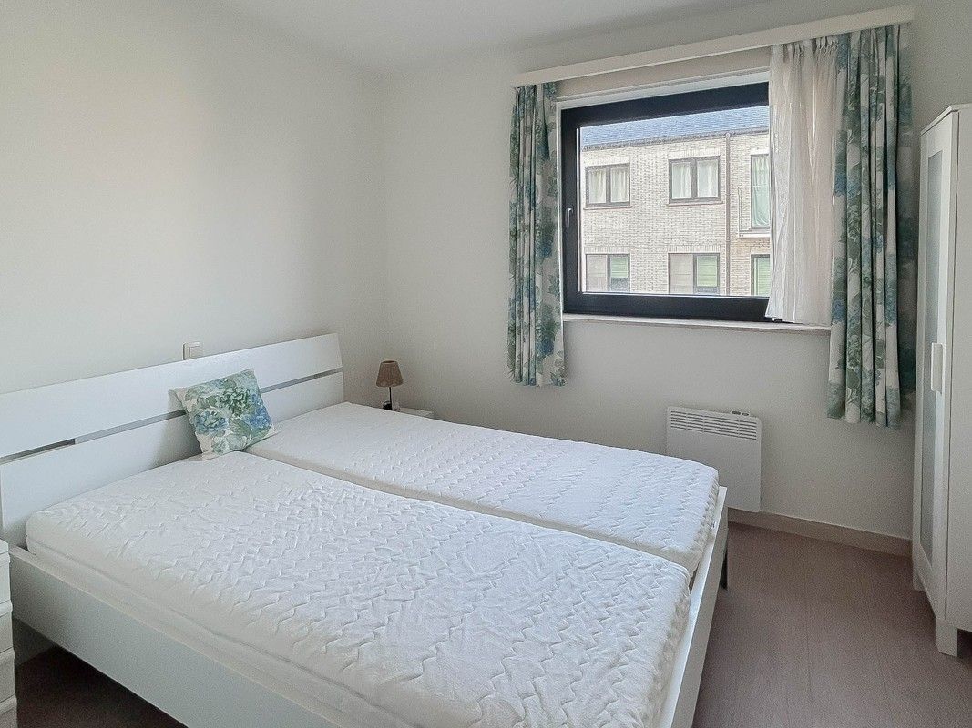 Gemeubelde 2 slaapkamer appartement te huur foto 9