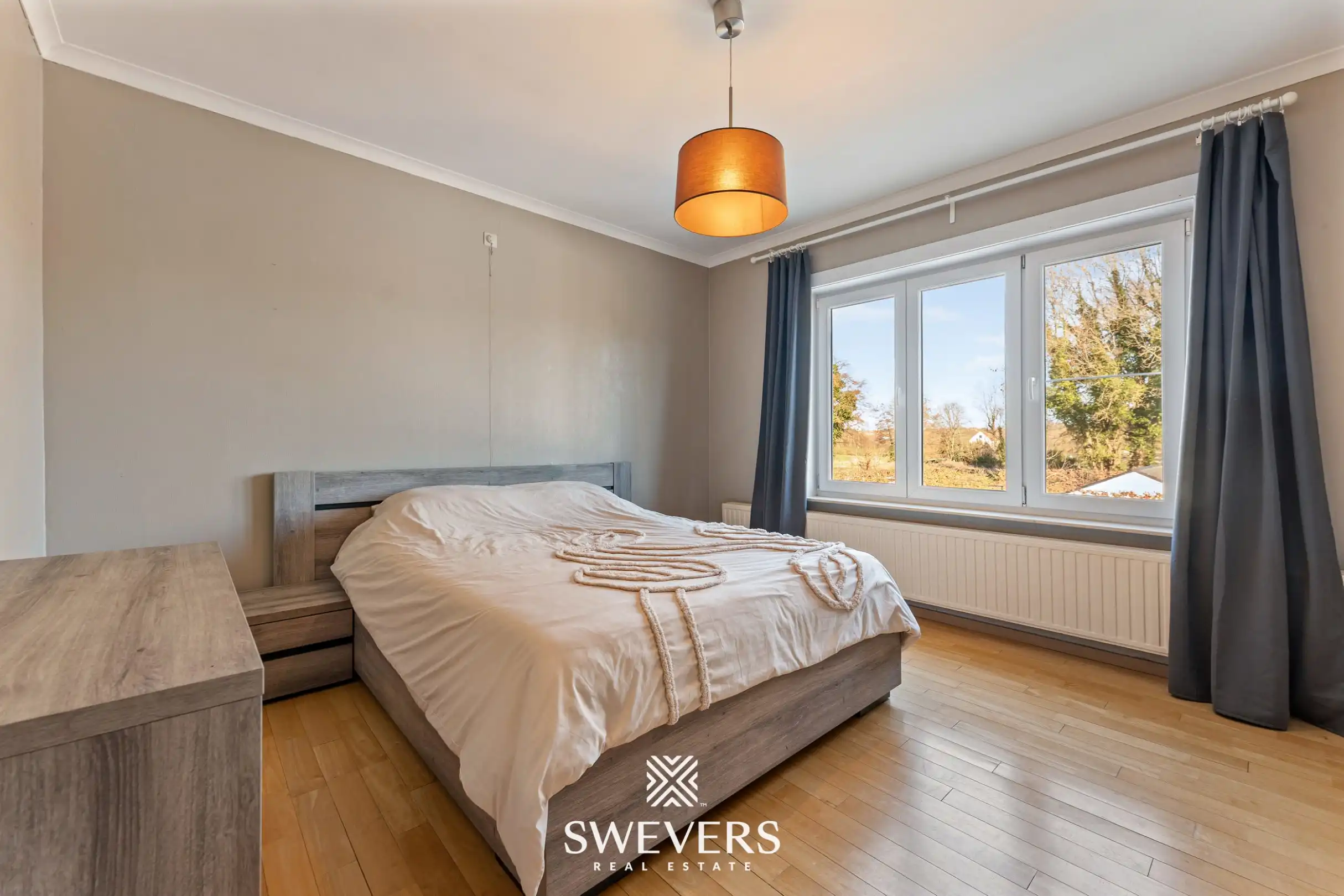 Karaktervolle gezinswoning met veel potentieel op 11a 74ca te Jesseren. foto 12