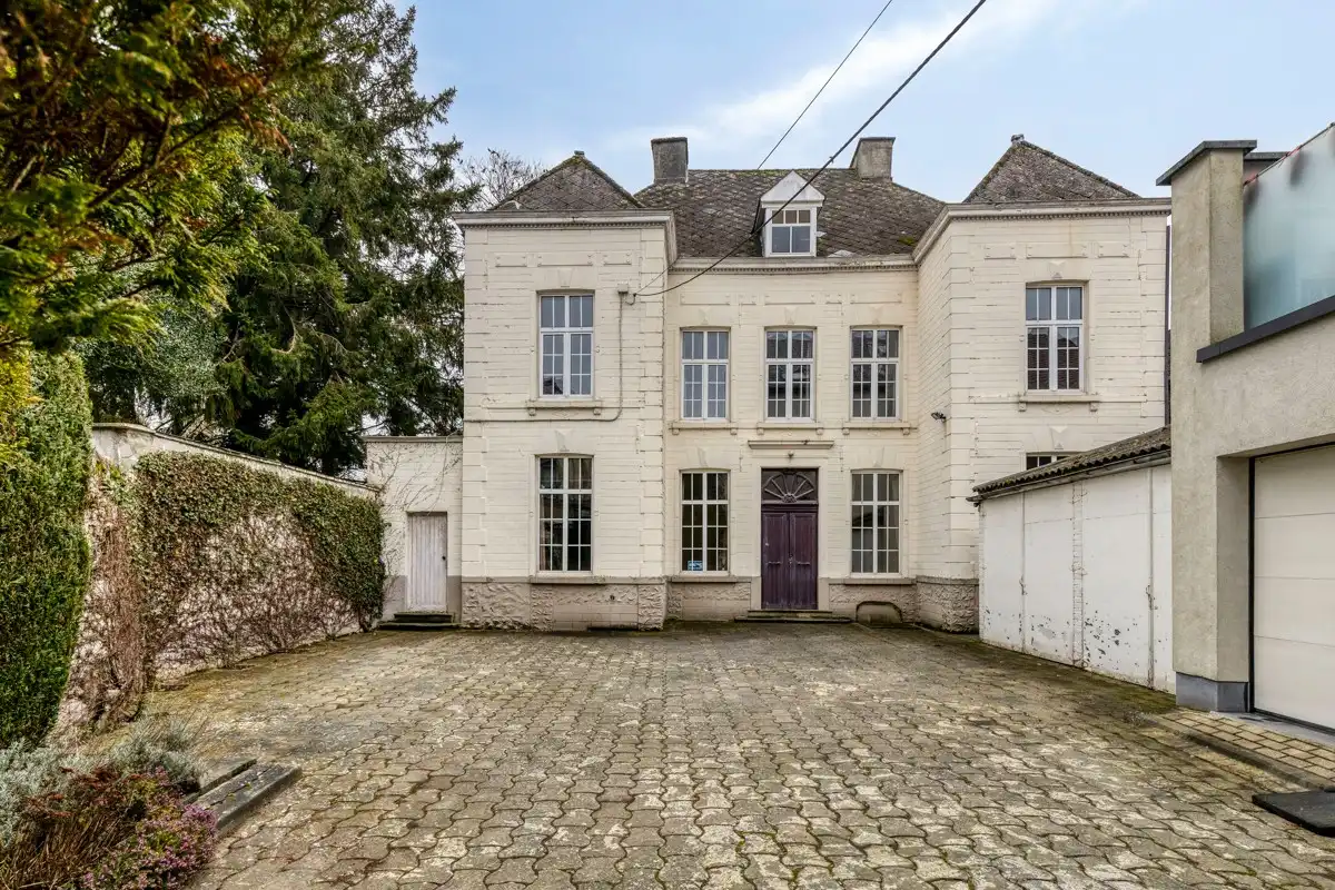 Statig herenhuis in het hart van Brakel foto 19