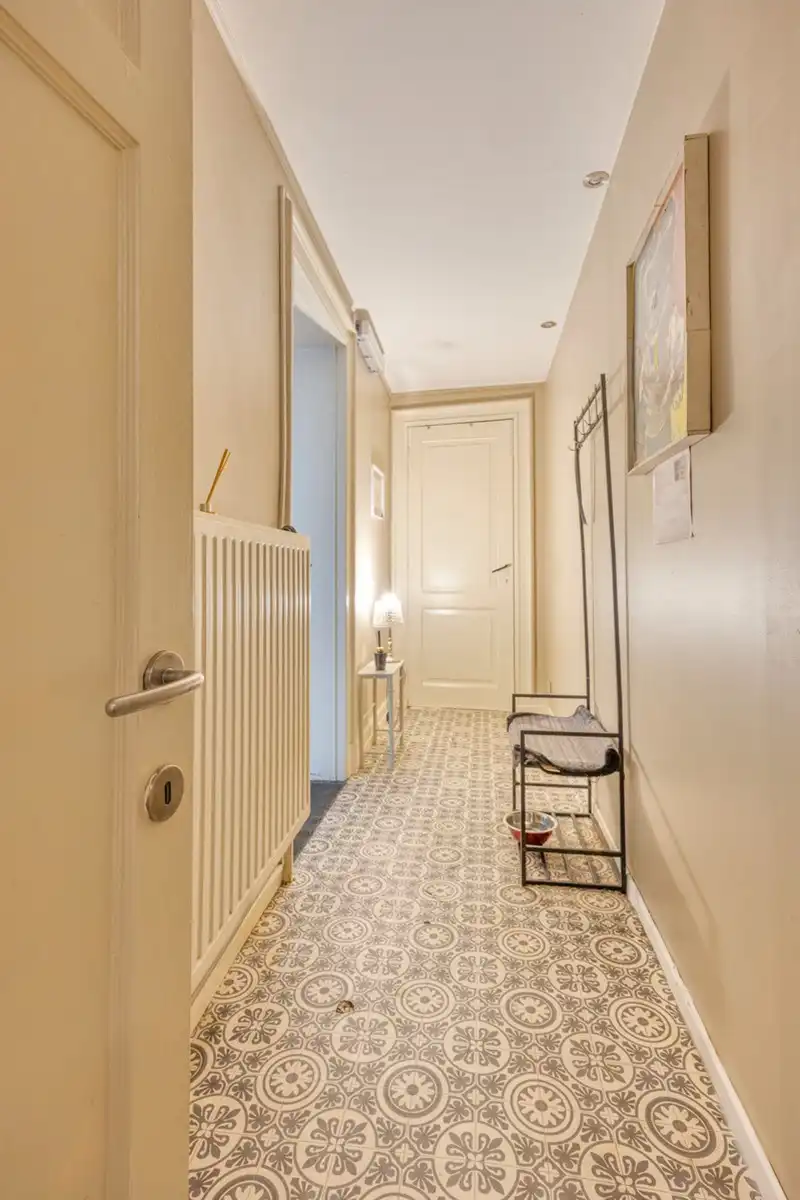 Karaktervol hoekpand met woning en appartement in Riemst foto 13