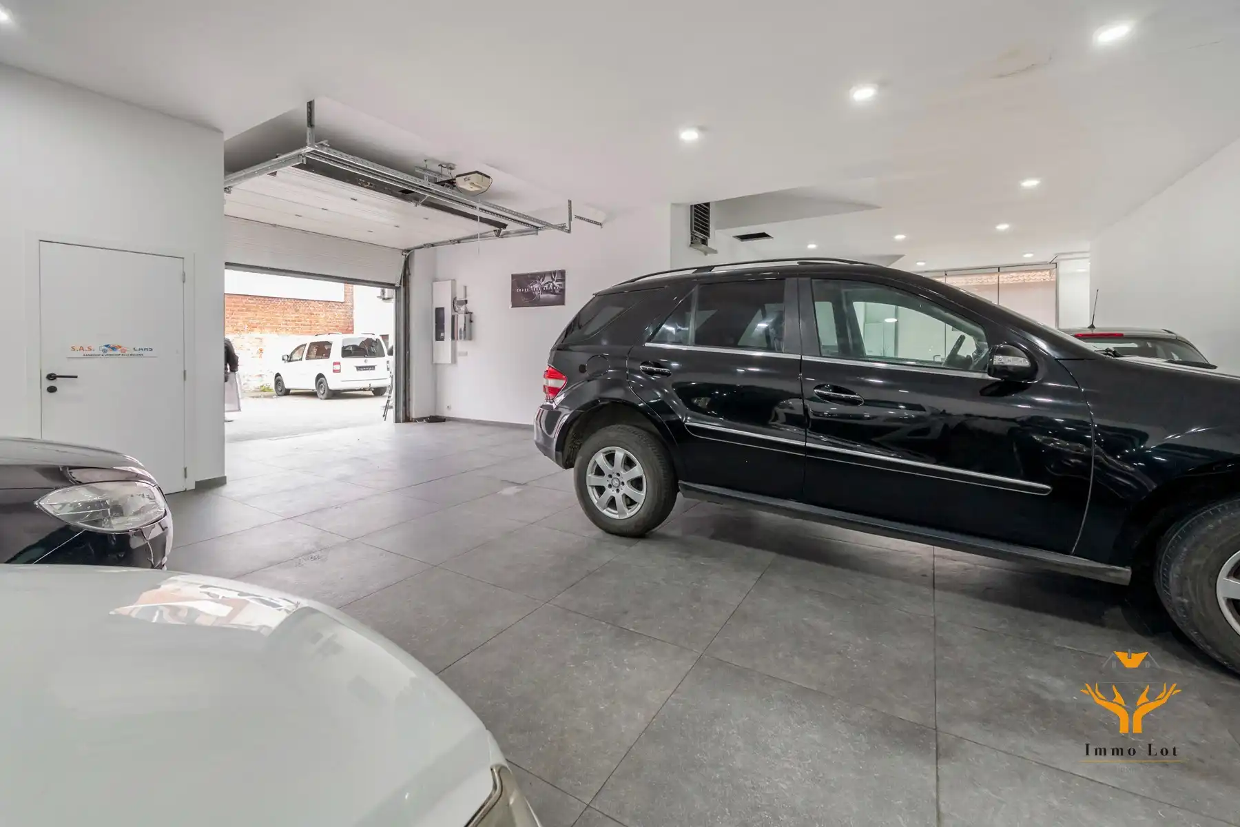 Woning met toonzaal, magazijn en garages te Hamme foto 21