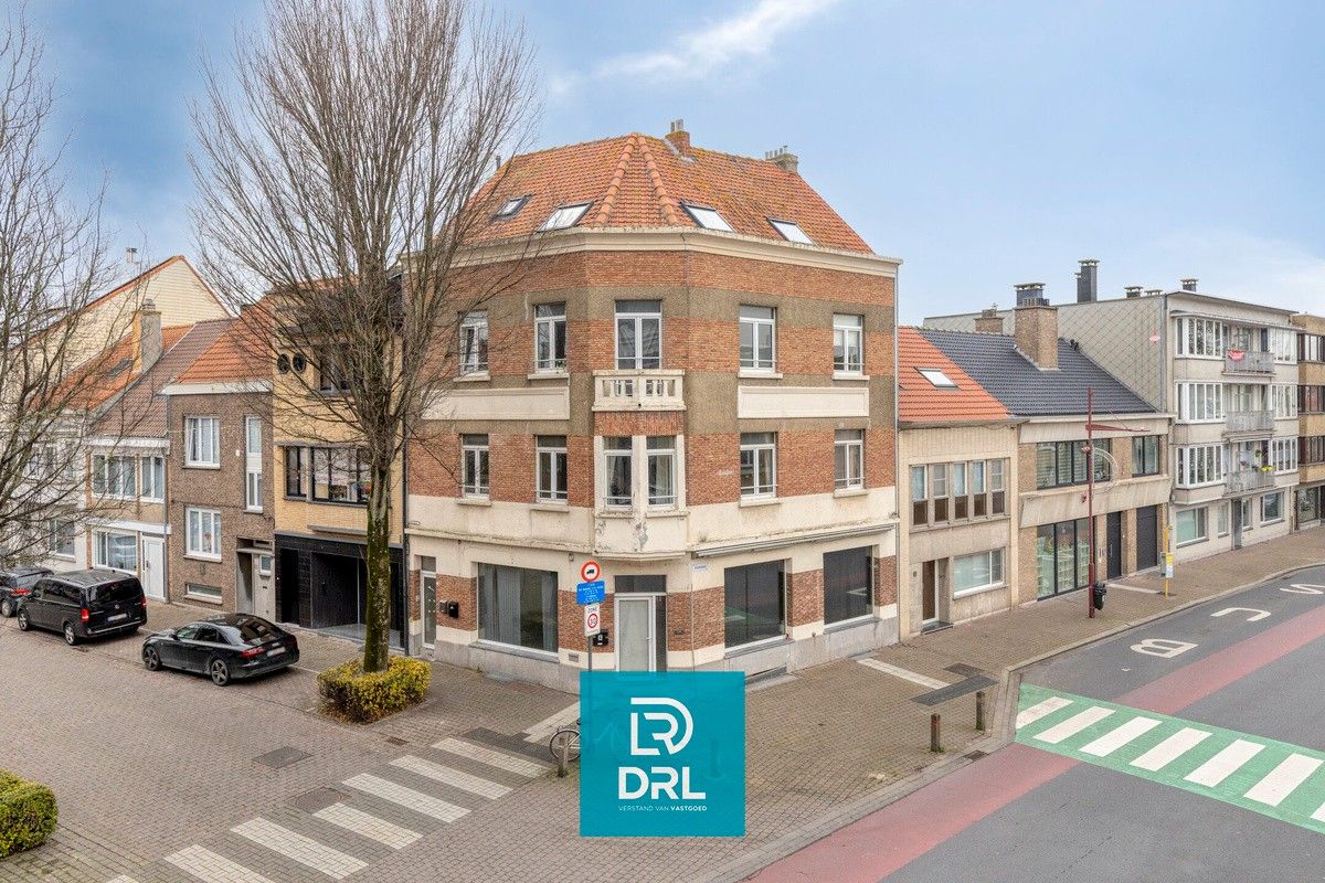 HANDELSHUIS met 2 APPARTEMENTEN te OOSTENDE foto {{pictureIndex}}