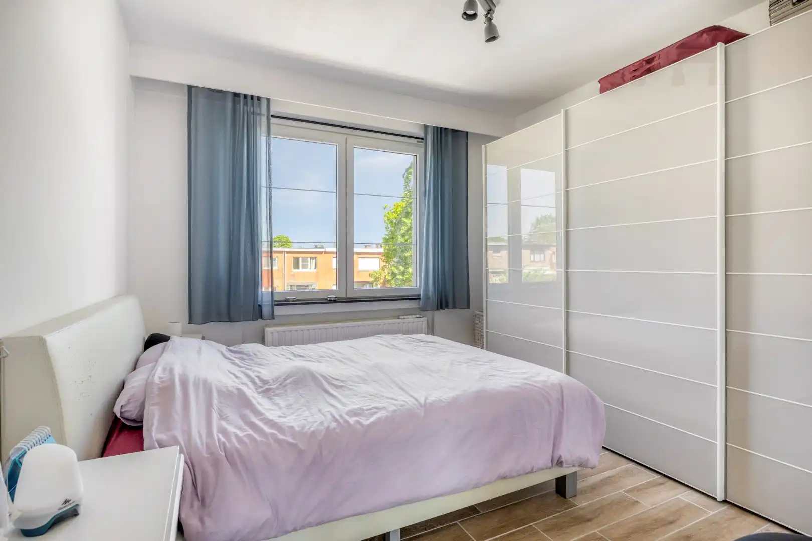 Hedendaags 2 slpk appartement met garage foto 9