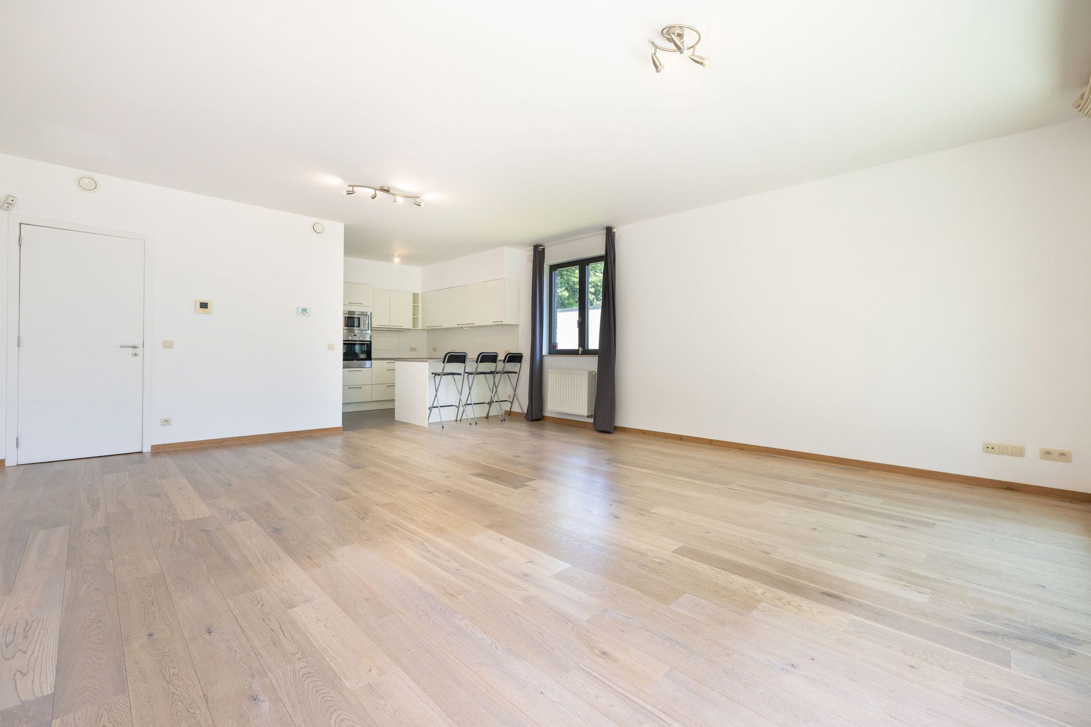 Appartement 3 slaapkamers ± 130 m² + tuin ± 200 m² + parkeerplaats foto 3