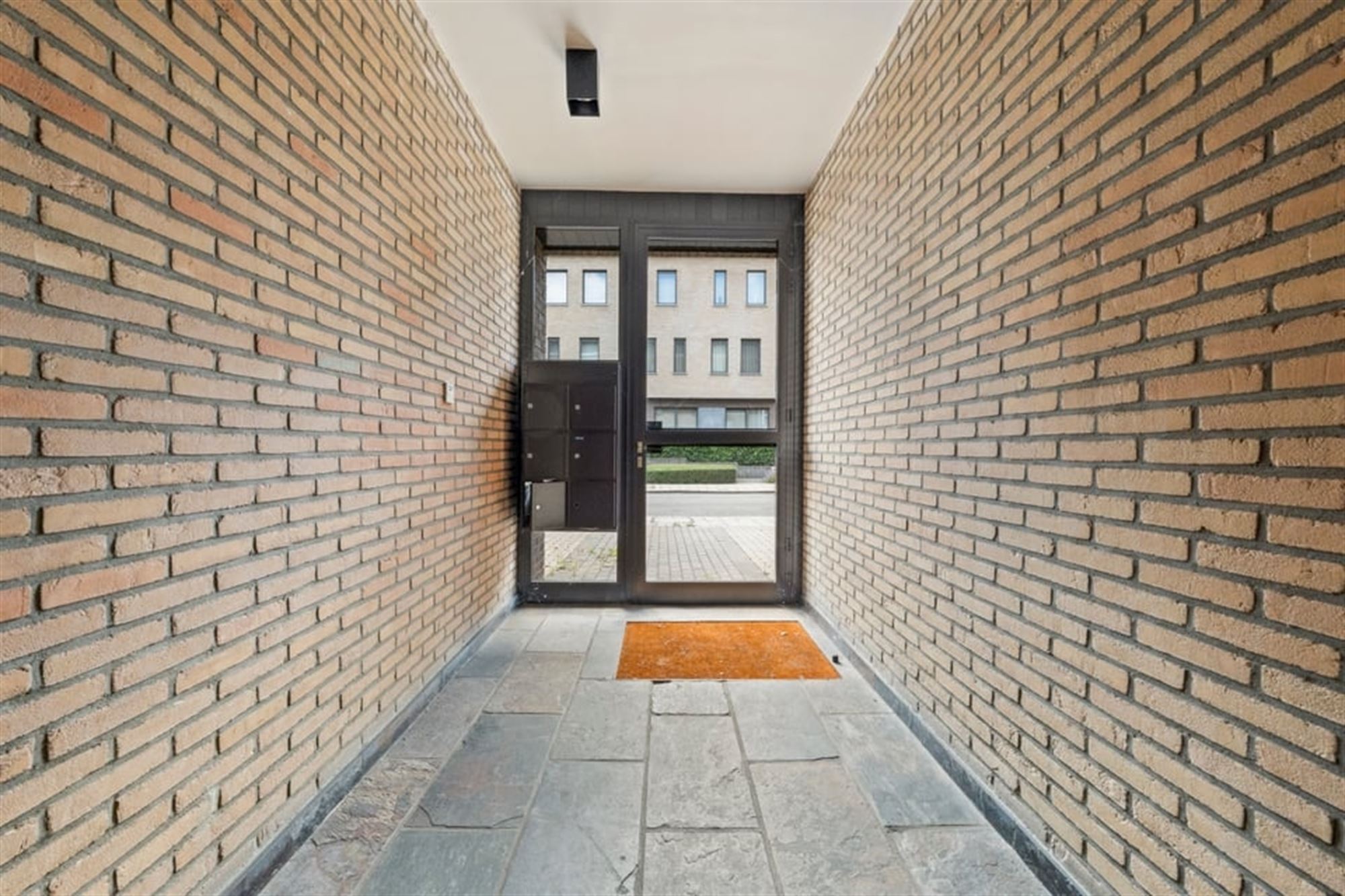 OPBRENGSTEIGENDOM MET 6 APPARTEMENTEN EN 4 STAANPLAATSEN IN SINT-TRUIDEN  foto 9