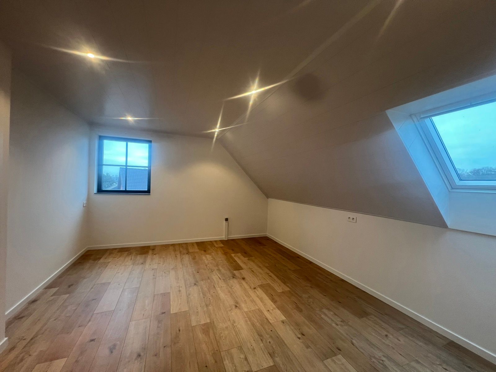 Instapklare nieuwbouwwoning met tuin en carport foto 15