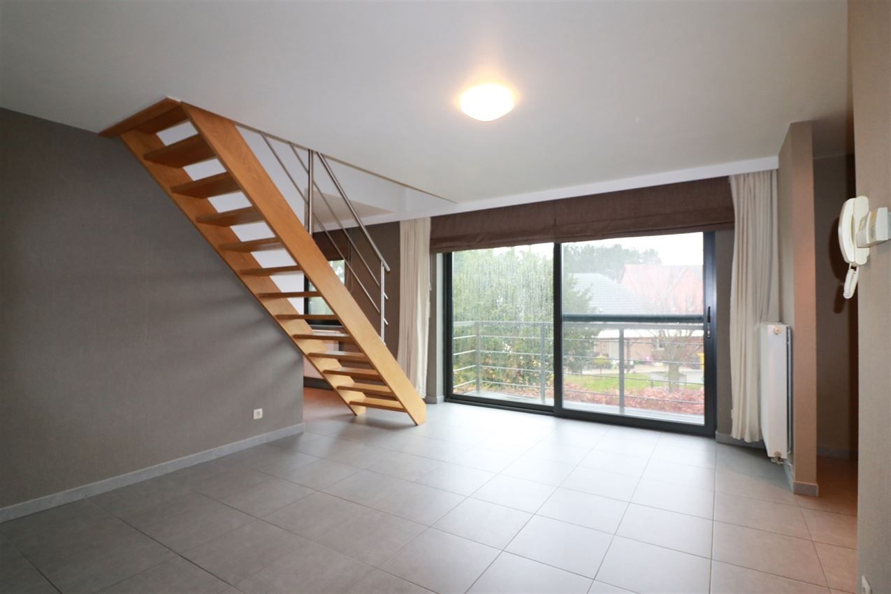 Duplex met 2 grote slpk, zuidterras, nabij station foto 2