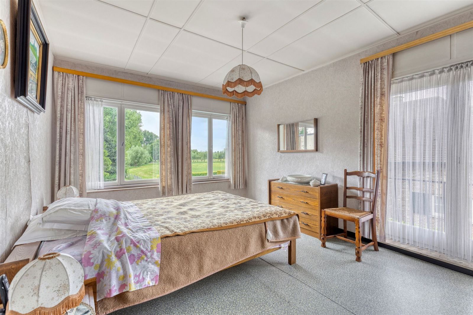 Driegevelwoning gelegen in groene omgeving foto 12