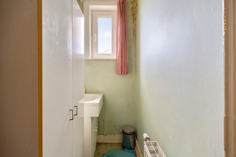 Statige renovatiewoning in charmante laan foto 12
