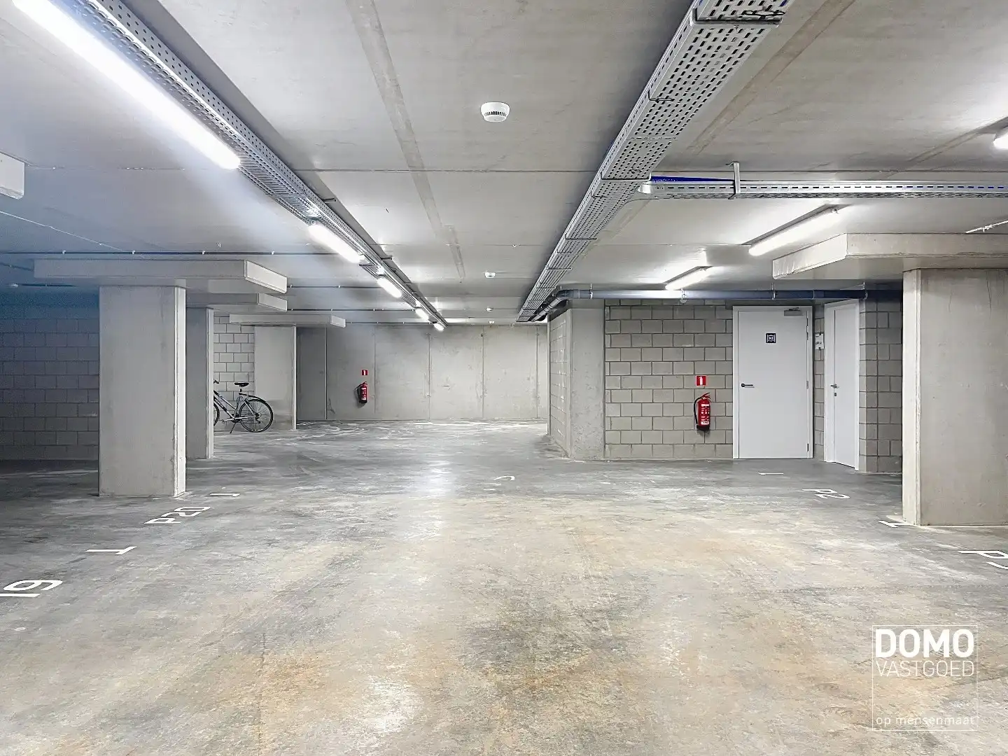 ONDERGRONDSE AUTOSTANDPLAATS TE HUUR IN CENTRUM KERMT (RESIDENTIE DE DRIESKENS) foto 4