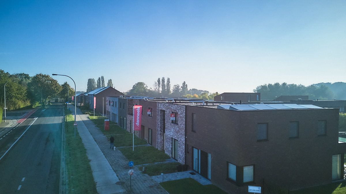 Energiezuinige stadswoning met 3 slpk's, carport en zuid gerichte tuin foto 4