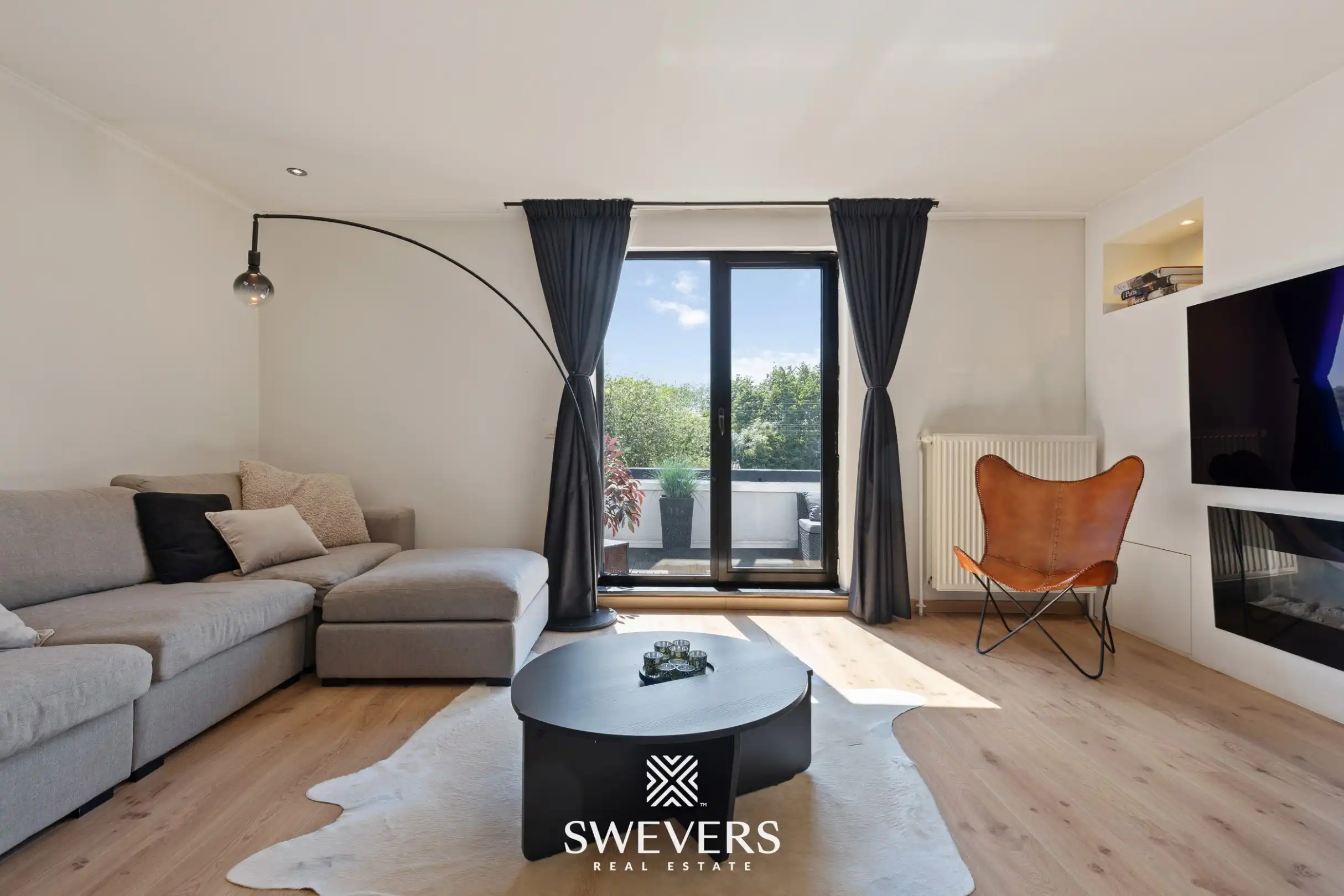 Instapklaar duplex appartement met 2 ruime slaapkamers en zonnig zuidgericht terras in Kermt foto {{pictureIndex}}