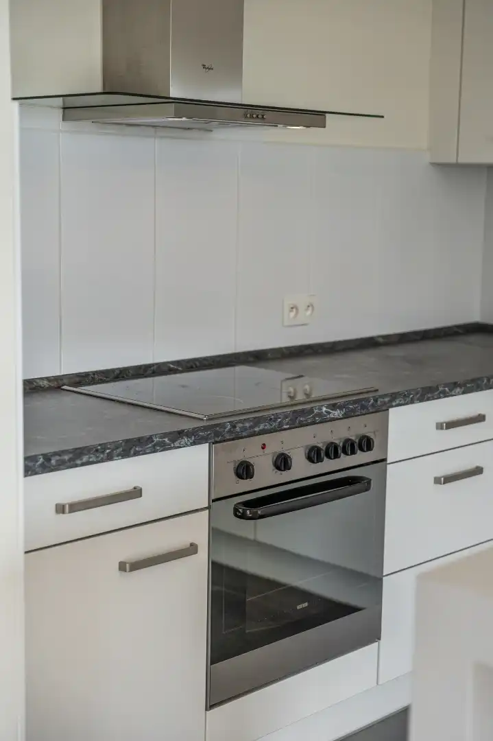 Exclusief penthouse met ruim terras, 2 slpk, extra brede autostaanplaats, centrum Houthalen foto 13