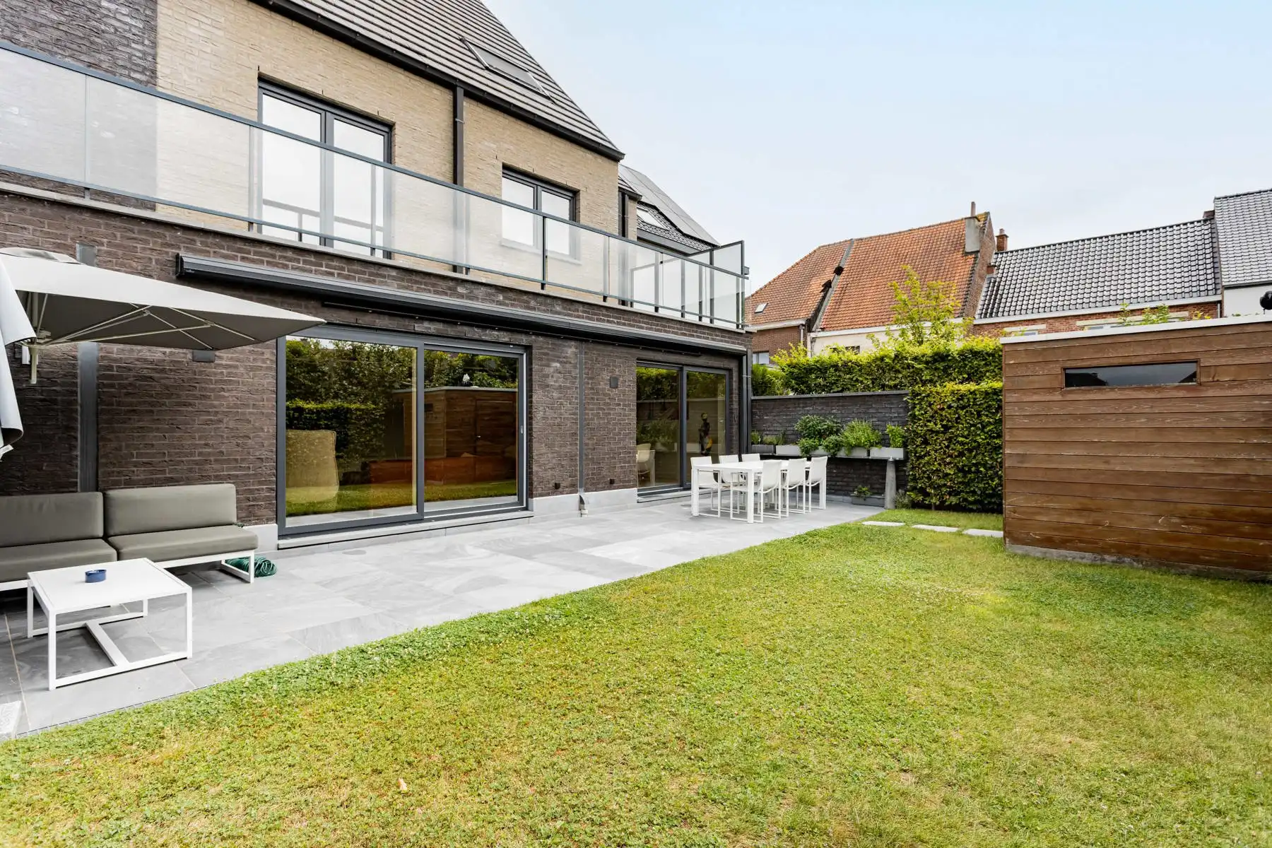 Gelijkvloers app. met tuin en 2 ondergrondse staanplaatsen foto 18