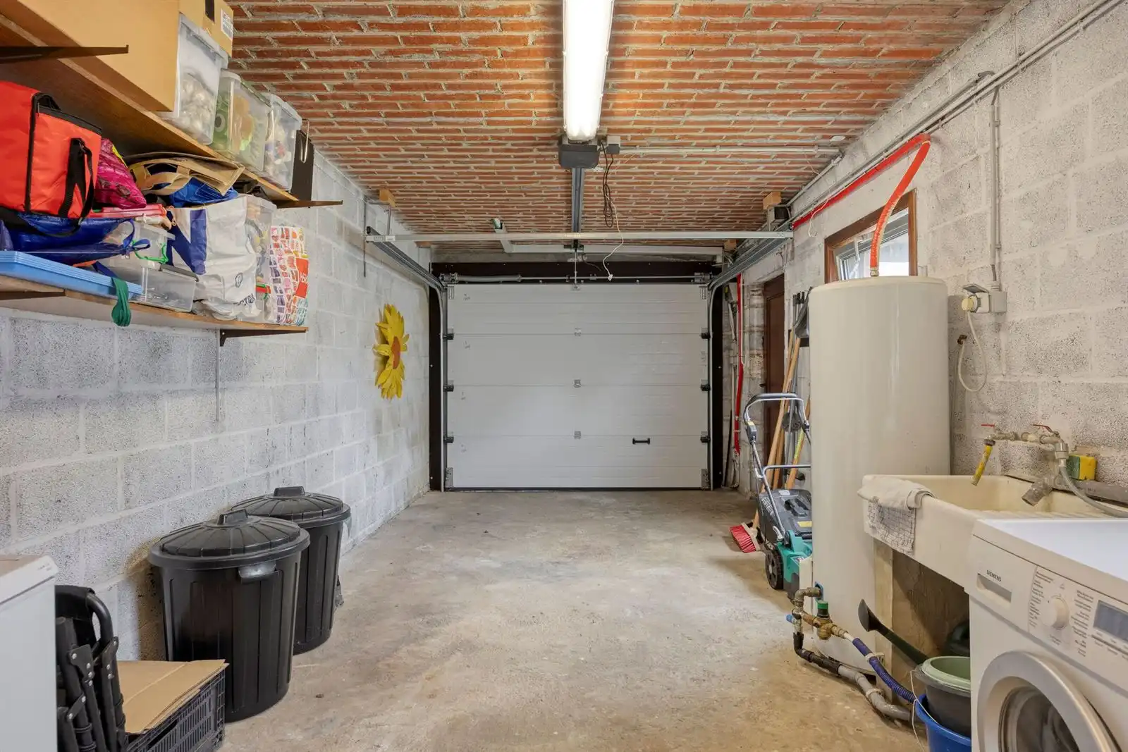 Instapklaar gelijkvloers appartement met 2 slaapkamers, garage en zonnige tuin foto 19