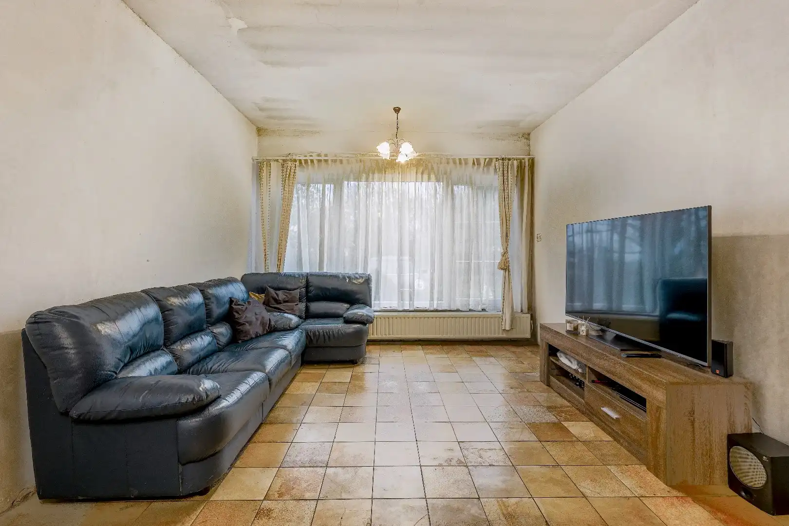 Op te knappen karakteristieke hoekwoning, 4 slpk, (EPC-label C) gelegen aan het Haspengouwse landschap. foto 22