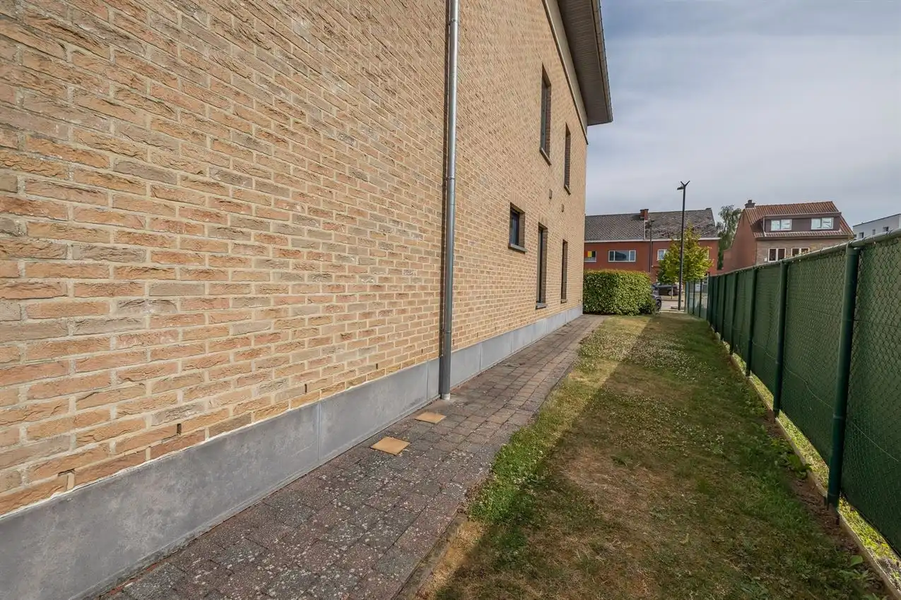 Ruim gelijkvloers wonen met tuin én rendement. foto 28