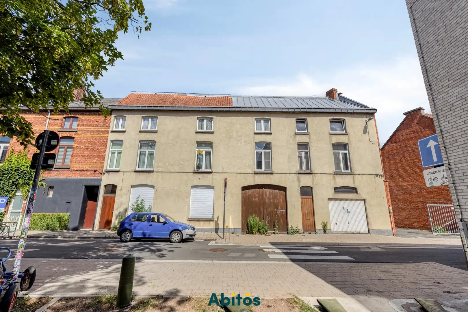 Opbrengsteigendom met 2 woningen, loods en garage in Gent foto 6