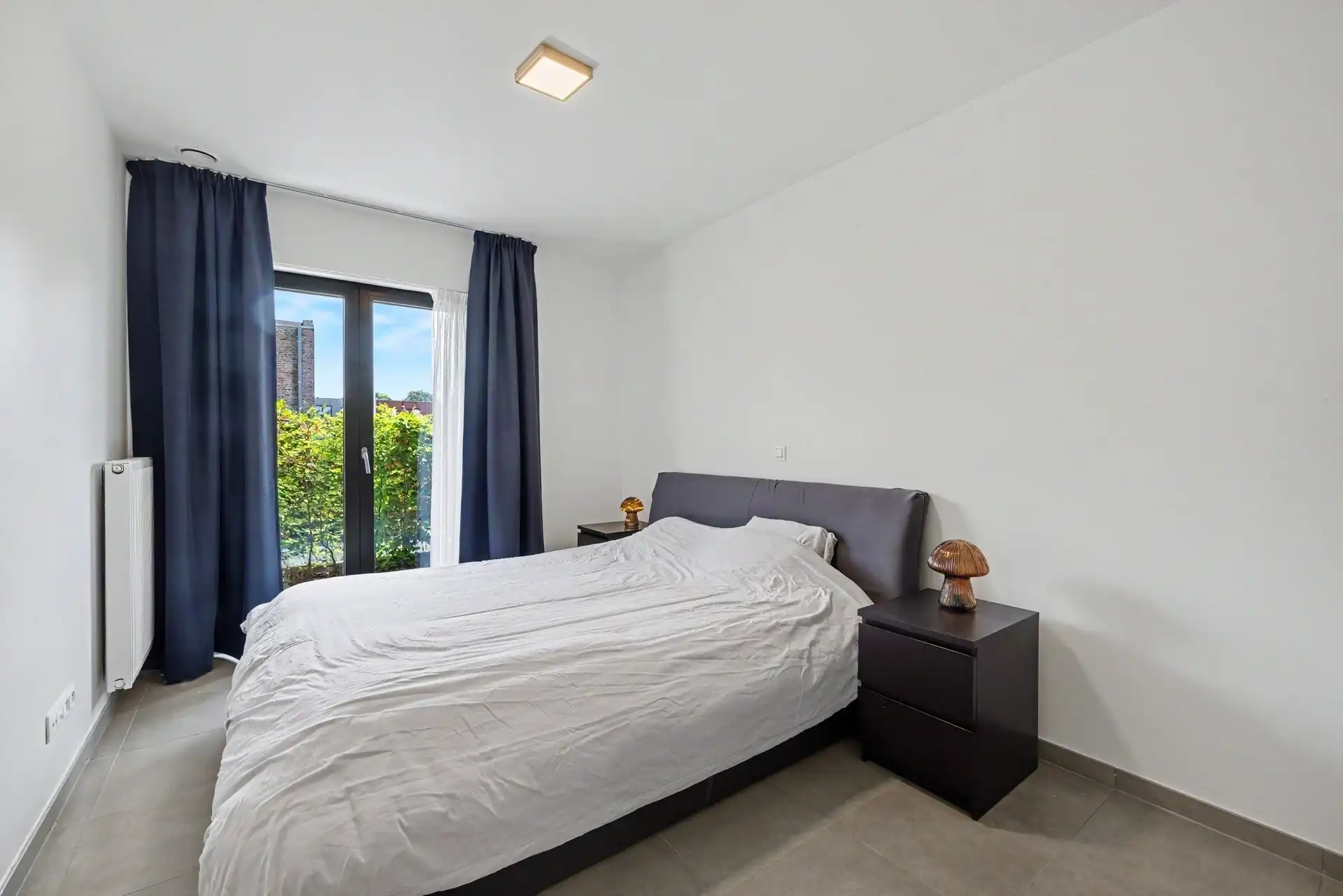 Instapklaar gelijkvloersappartement met 2 slaapkamers & ondergrondse autostaanplaats foto 11