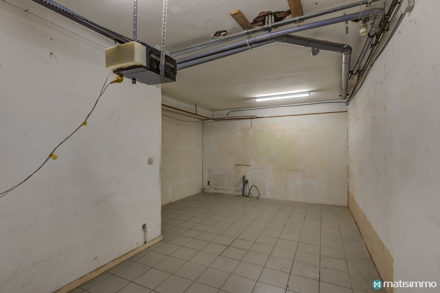 GOED GELEGEN HANDELSRUIMTE MET RIANT WOONGEDEELTE IN CENTRUM VAN HOESELT foto 21