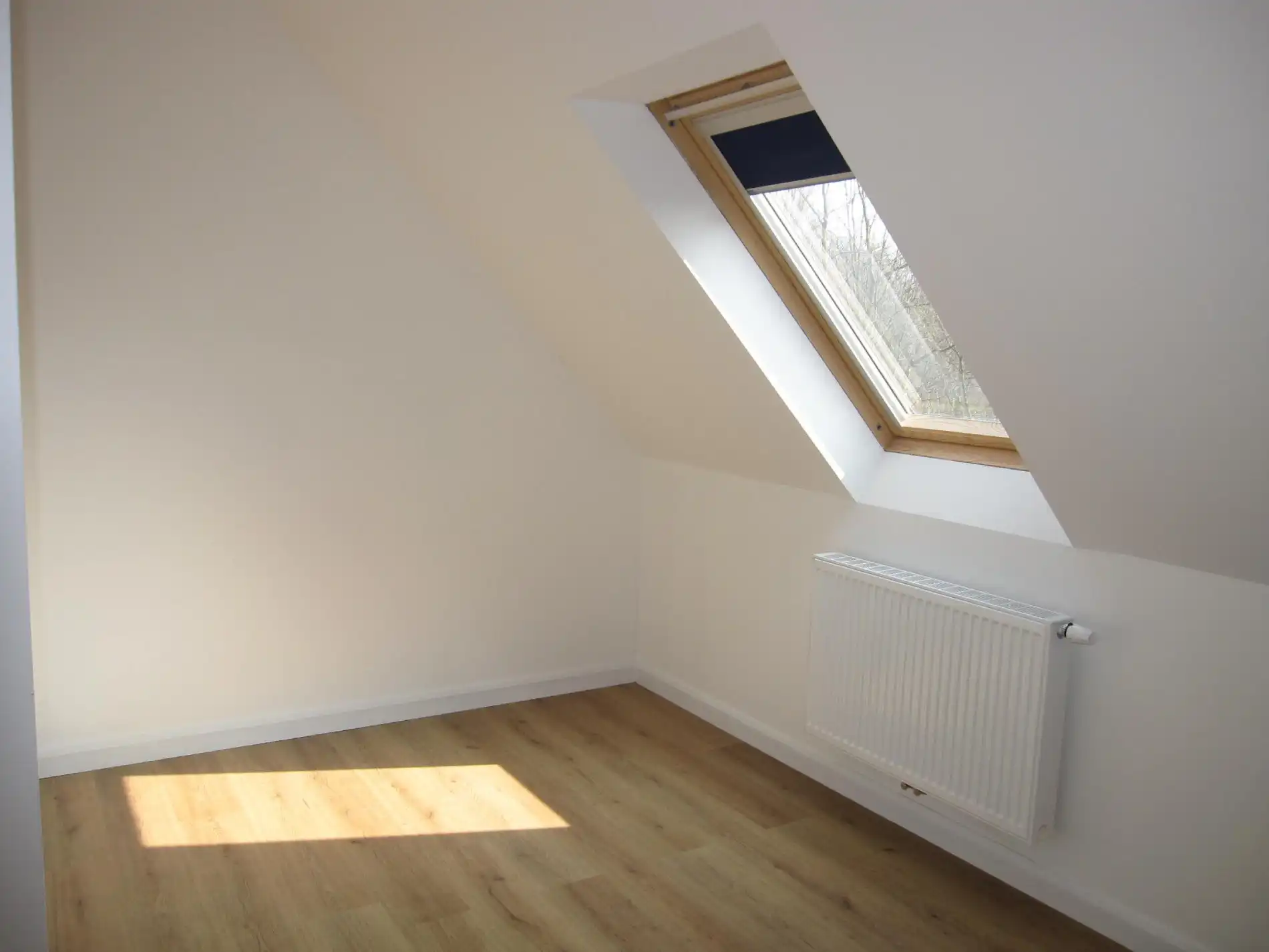 Ruim duplex-appartement met ondergrondse staanplaats en berging foto 7
