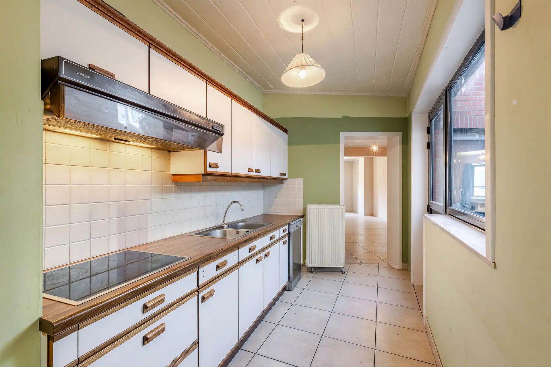 Verhuurde opbrengsteigendom bestaande uit handelspand en duplexappartement in het centrum van Ninove foto 13