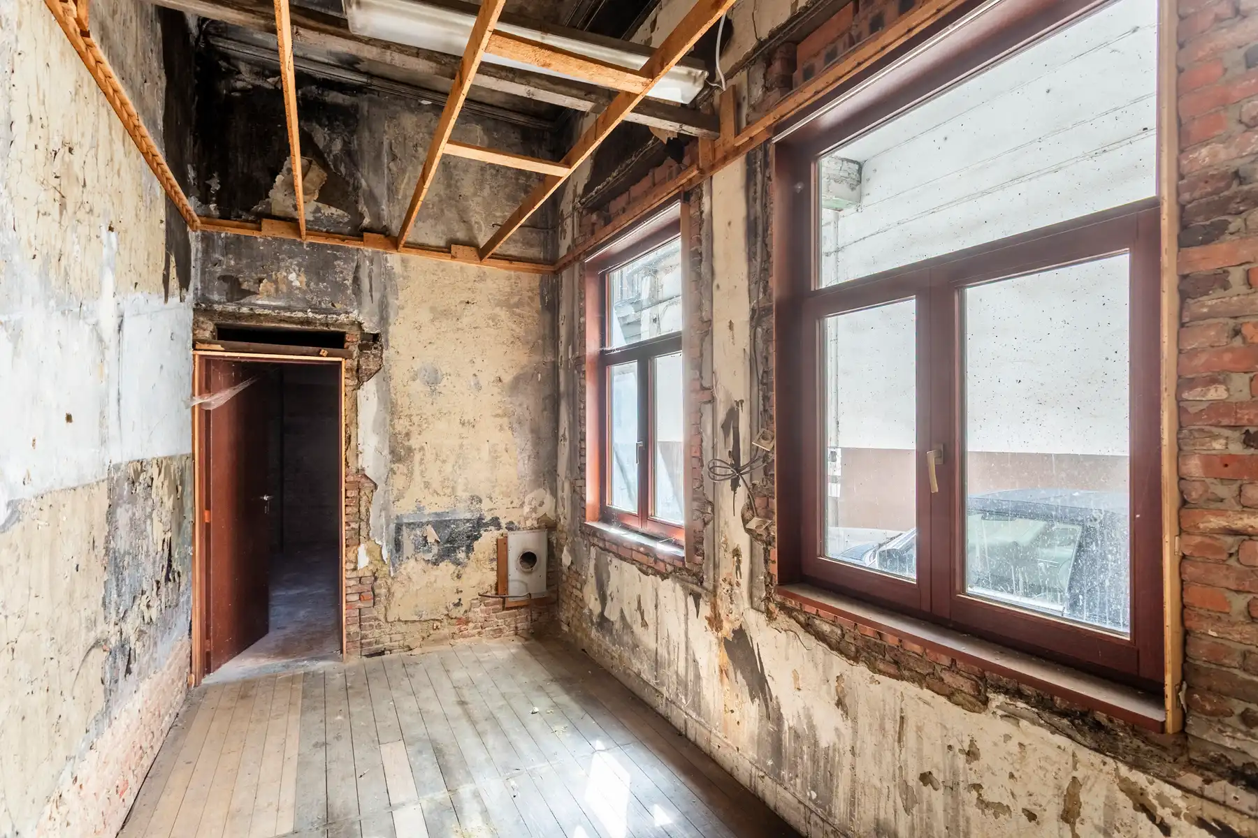Te renoveren dubbele herenwoning met magazijn op 't Zuid foto 7