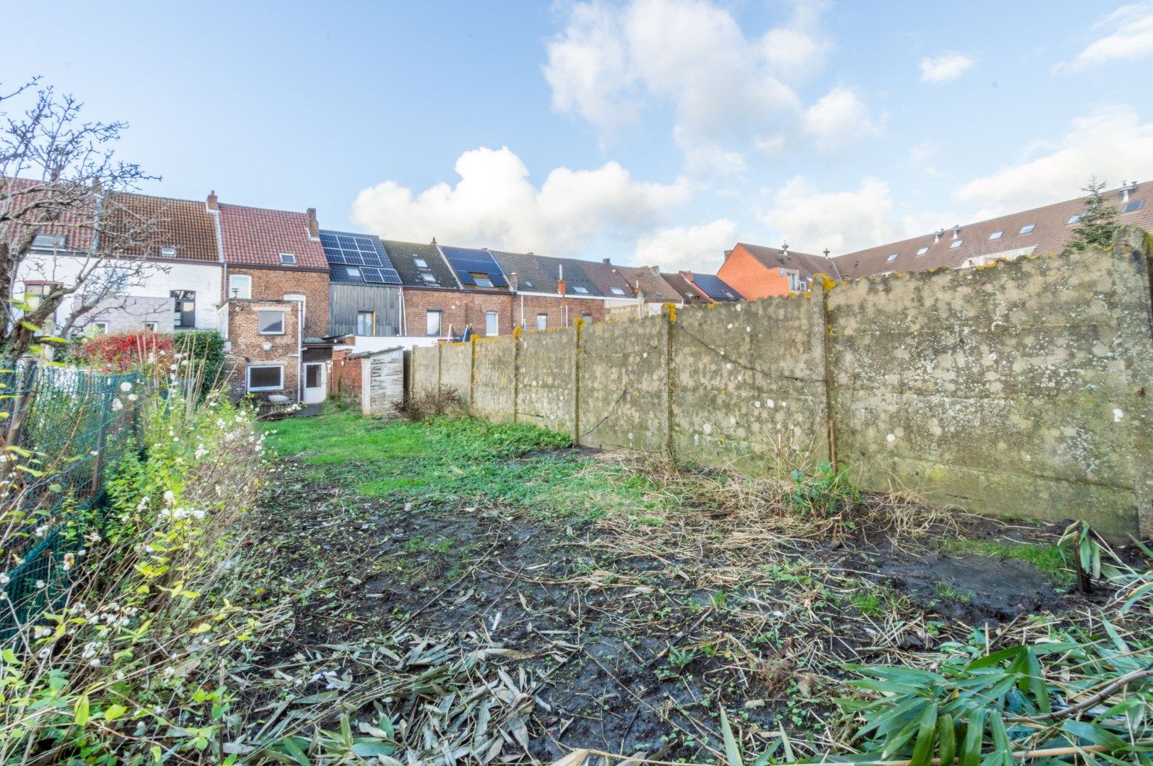 Ruime, te renoveren woning met 4 slaapkamers + zuid-tuin! foto 5