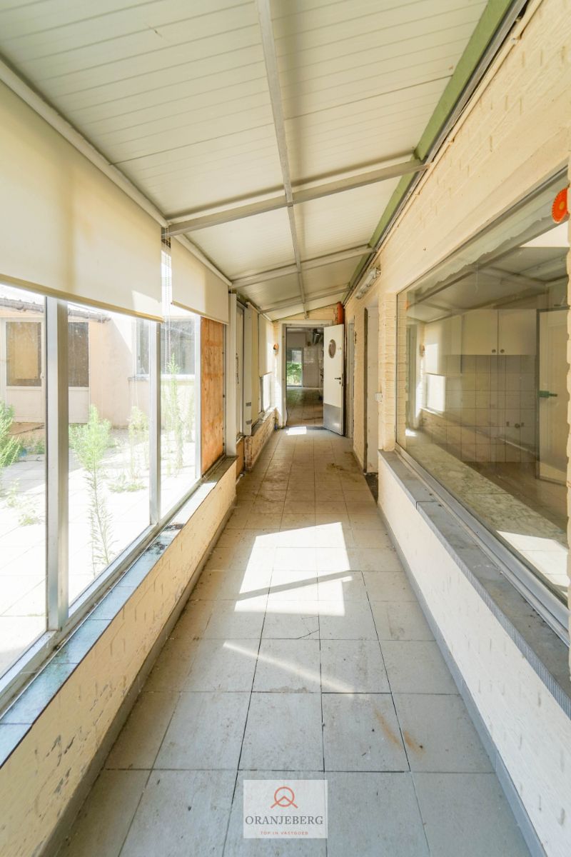 Ideaal te renoveren rijwoning + werkplaats + garage + tuin voor 591m² foto 13