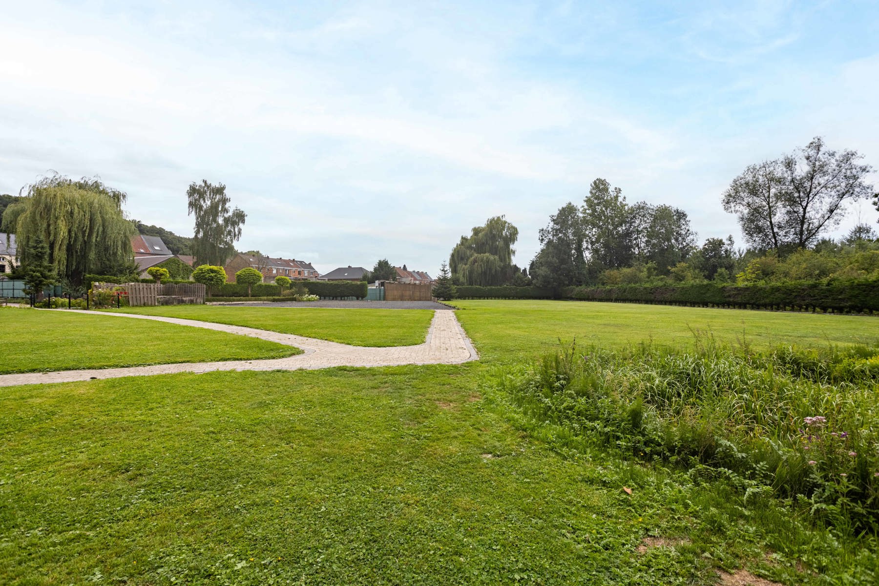 Ruime handelswoning met ruimte voor praktijk, prachtige tuin foto 18