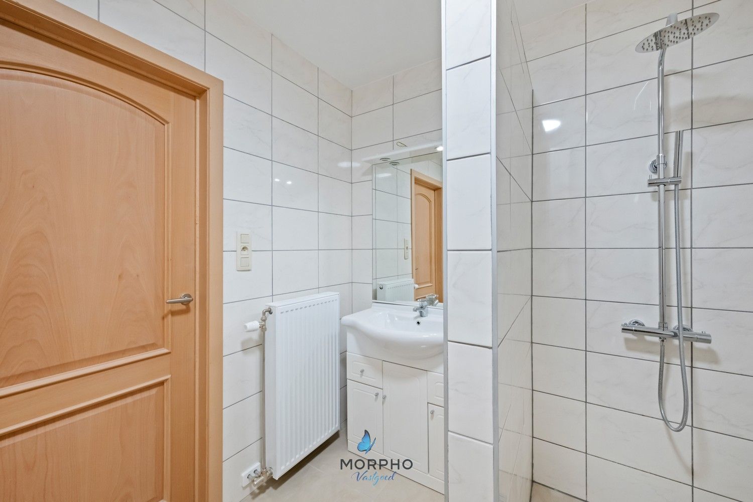 Modern en energiezuinig 2-slaapkamerappartement op de tweede verdieping in hartje Temse! foto 16