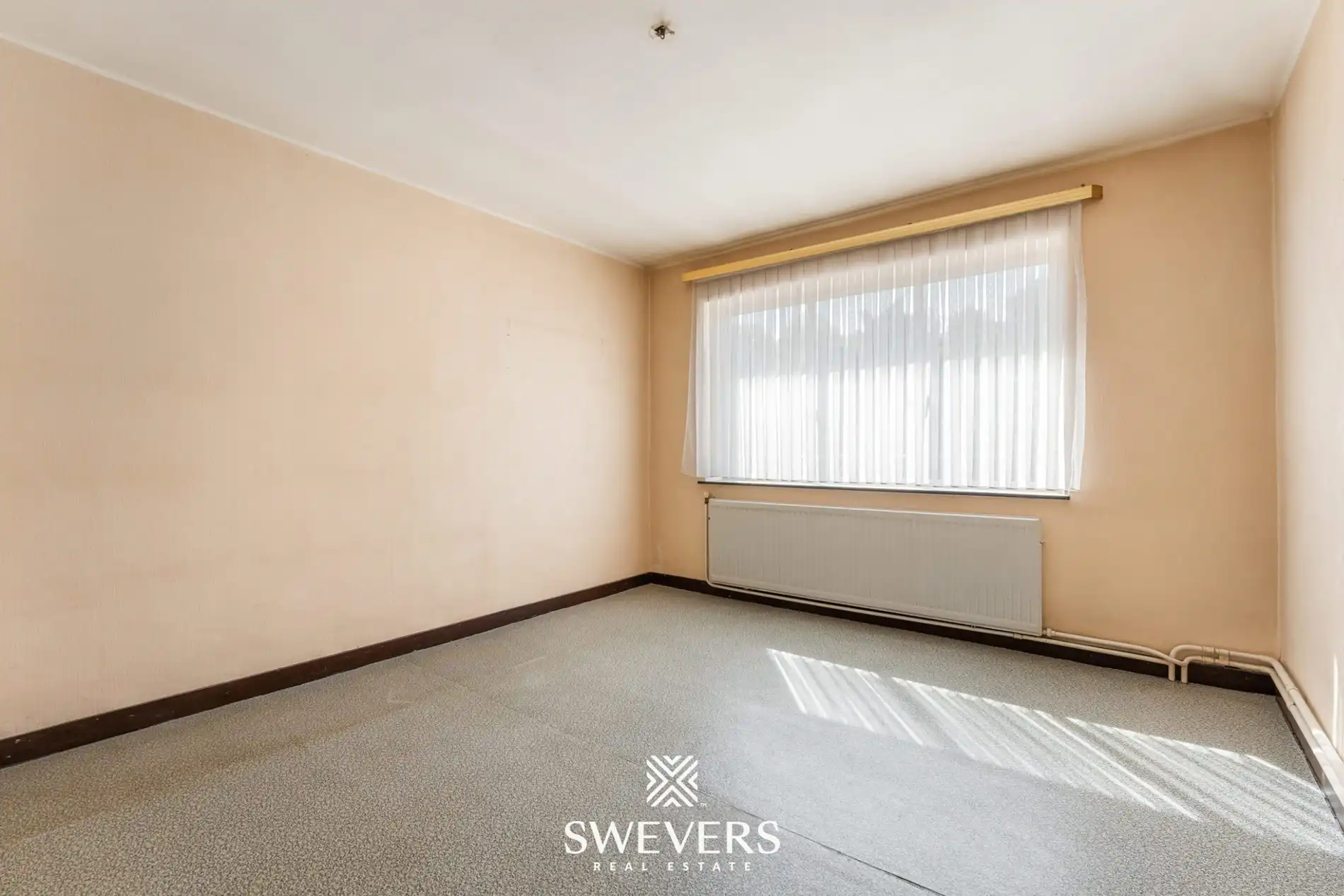 Te renoveren woning met grote tuin en 5 slaapkamers in Genk foto 13