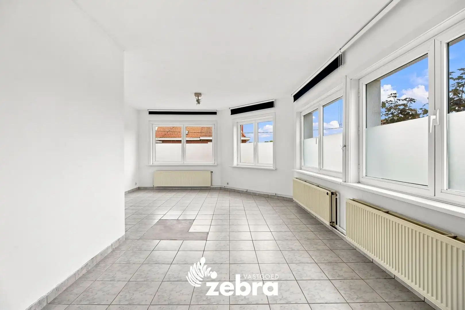 Kloeke hoekwoning met veel potentieel in Roeselare! foto 13