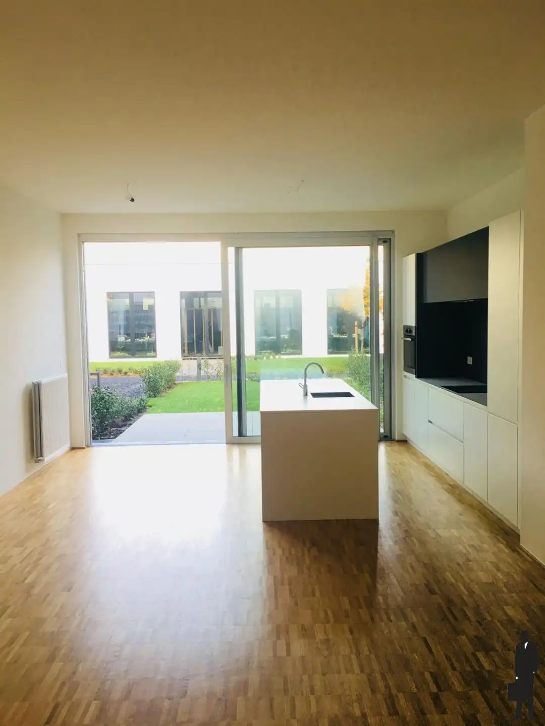 Gezellig gelijkvloers appartement met 2 slaapkamers en mooie tuin foto 3