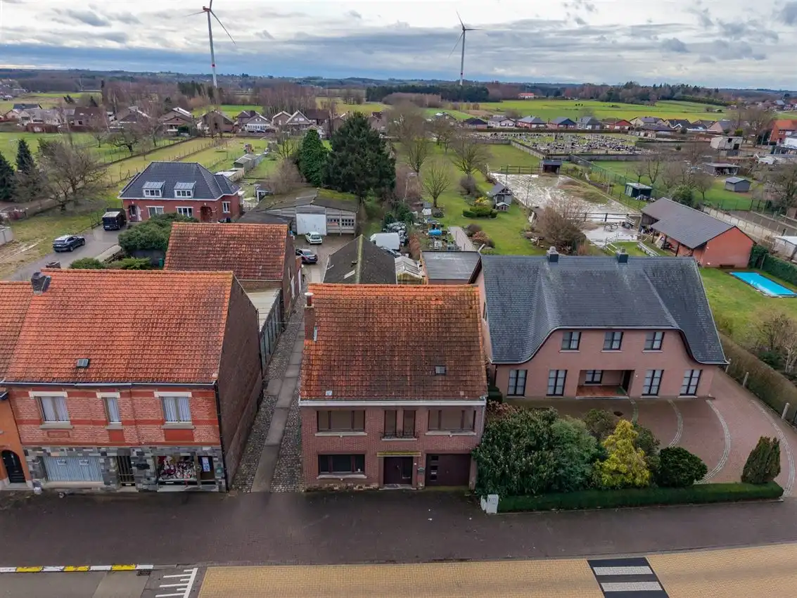 Woning met 3slk, tuintje en werkhuis foto 3