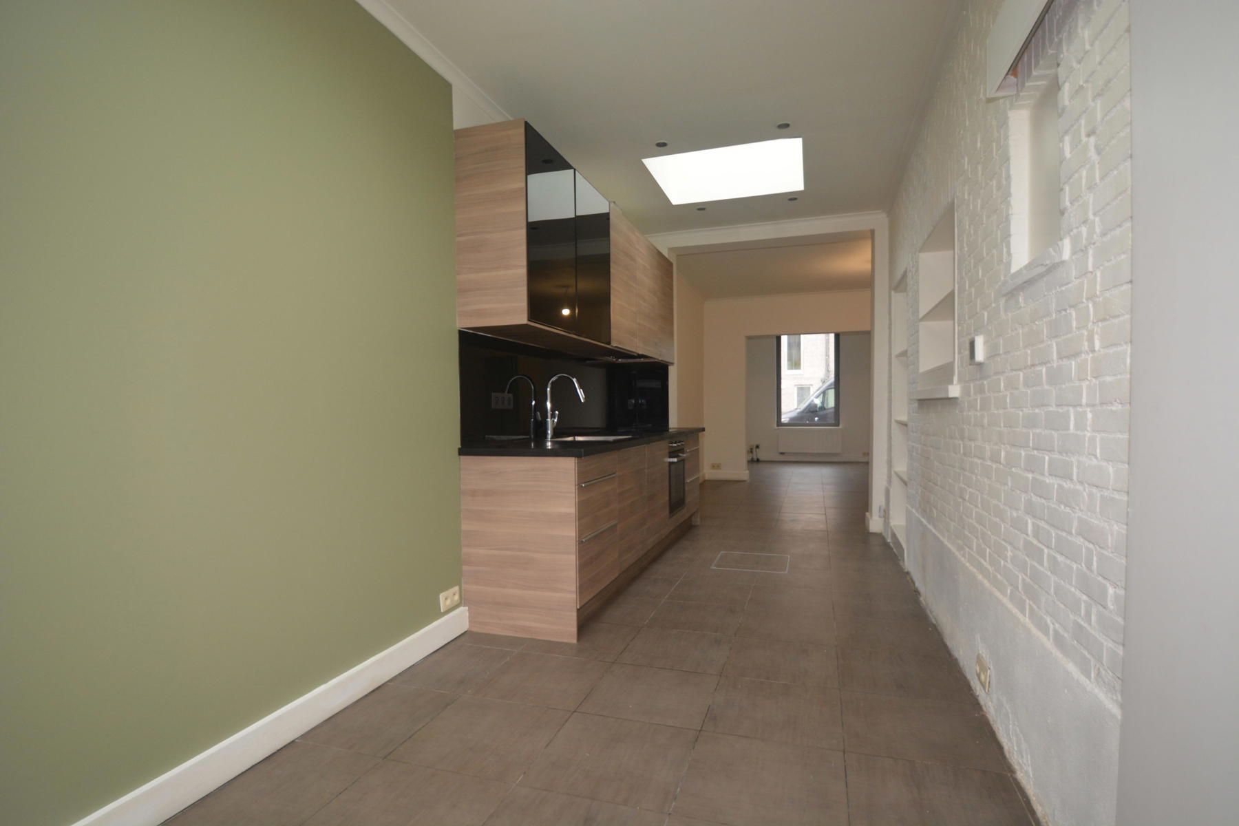 Gezellige woning met 3 slaapkamers en een tuintje foto 4