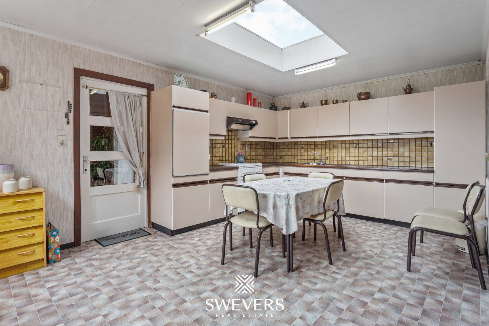 Te renoveren woning met grote tuin in hartje Wellen foto 10