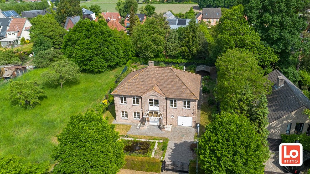 Statige ruime villa met inpandige én afzonderlijke garage op een groene toplocatie nabij Bergenkruis en het centrum van Destelbergen. foto 3