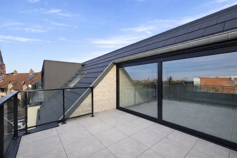 Appartement op het tweede verdiep met ruim terras voor- en achteraan. foto 8