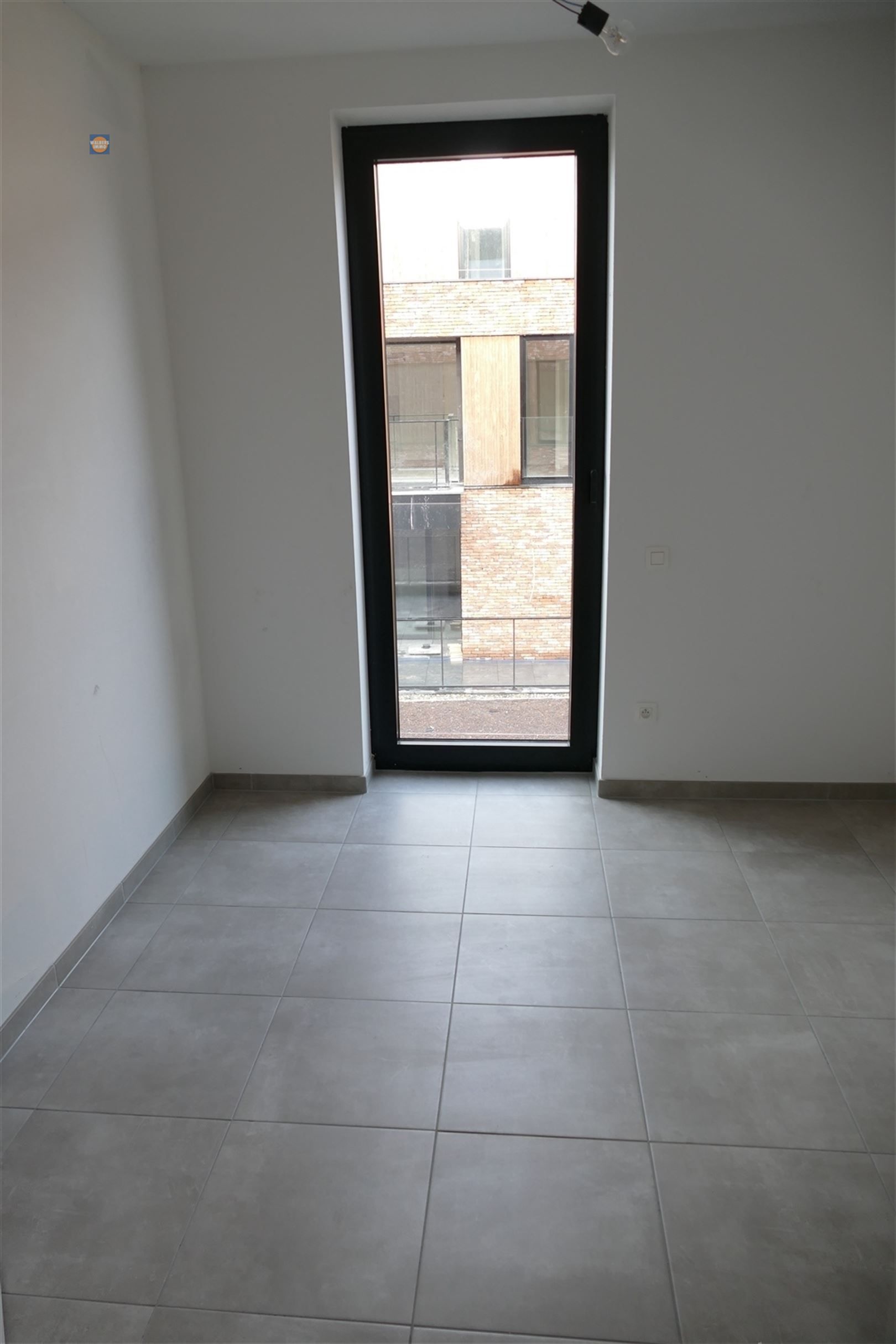 Lichtrijk appartement met terras en autostaanplaats op centrale ligging foto 9