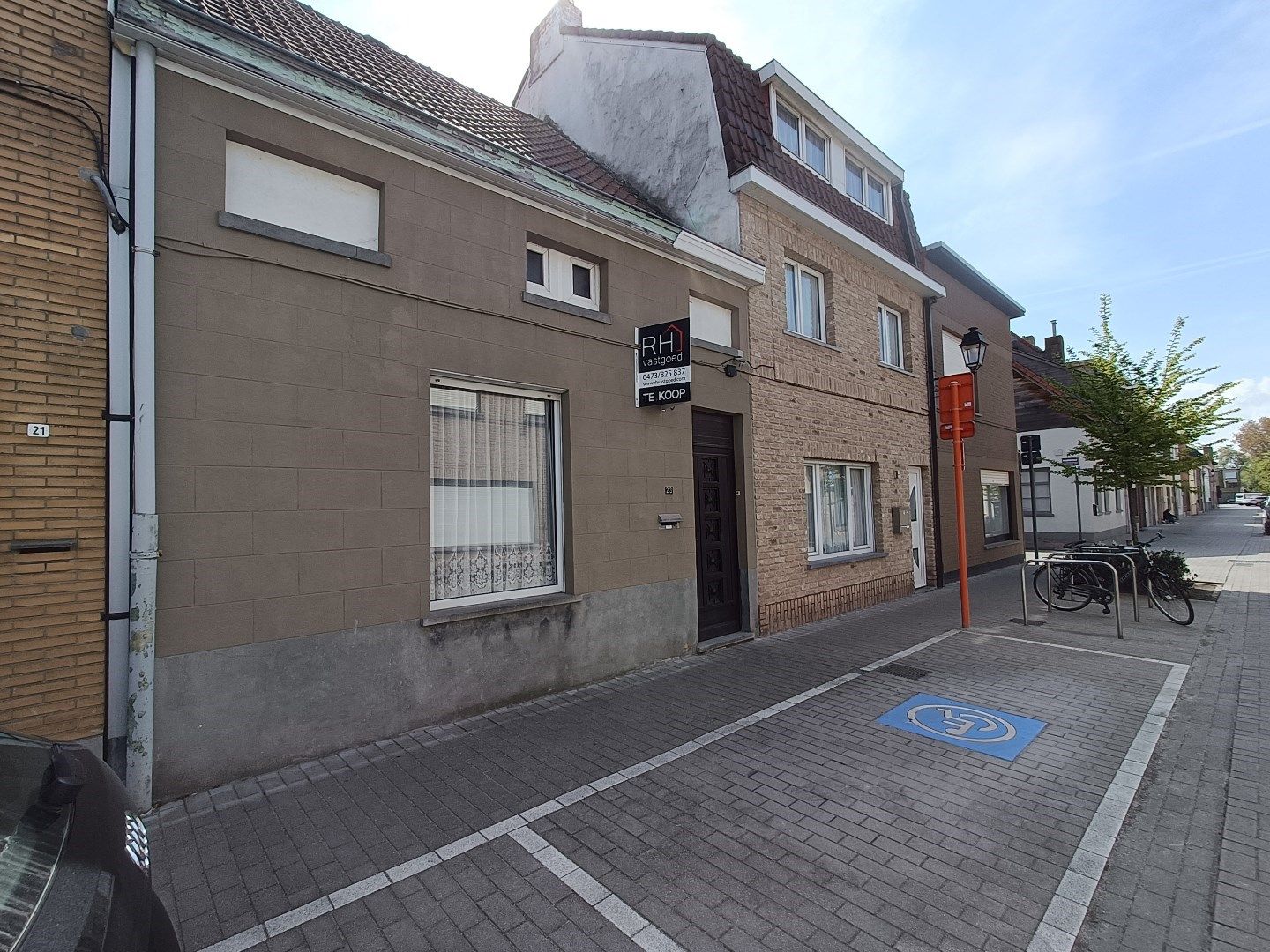 Te renoveren woning met zonnige stadskoer in het centrum van Heist foto 11