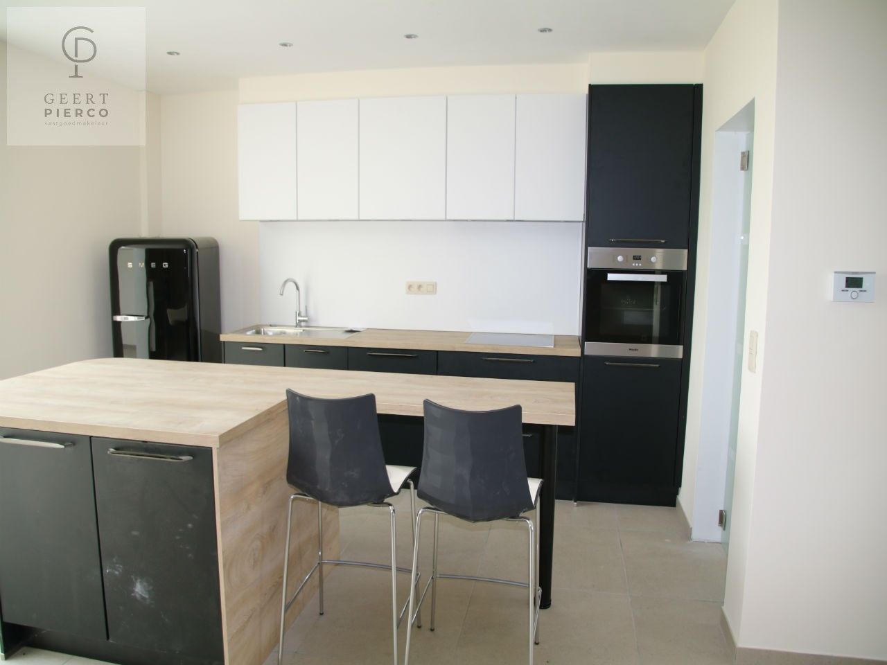 Prachtig gerenoveerde rijwoning met 4 slaapkamers aan de rand van Landen foto 8