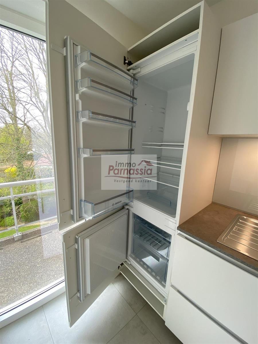 Volledig gerenoveerd appartement met gemeenschappelijke tuin foto 10