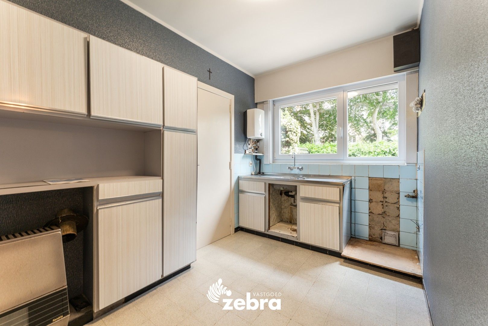 Op te frissen woning met 4 slaapkamers & garage op een topligging te Roeselare! foto 9