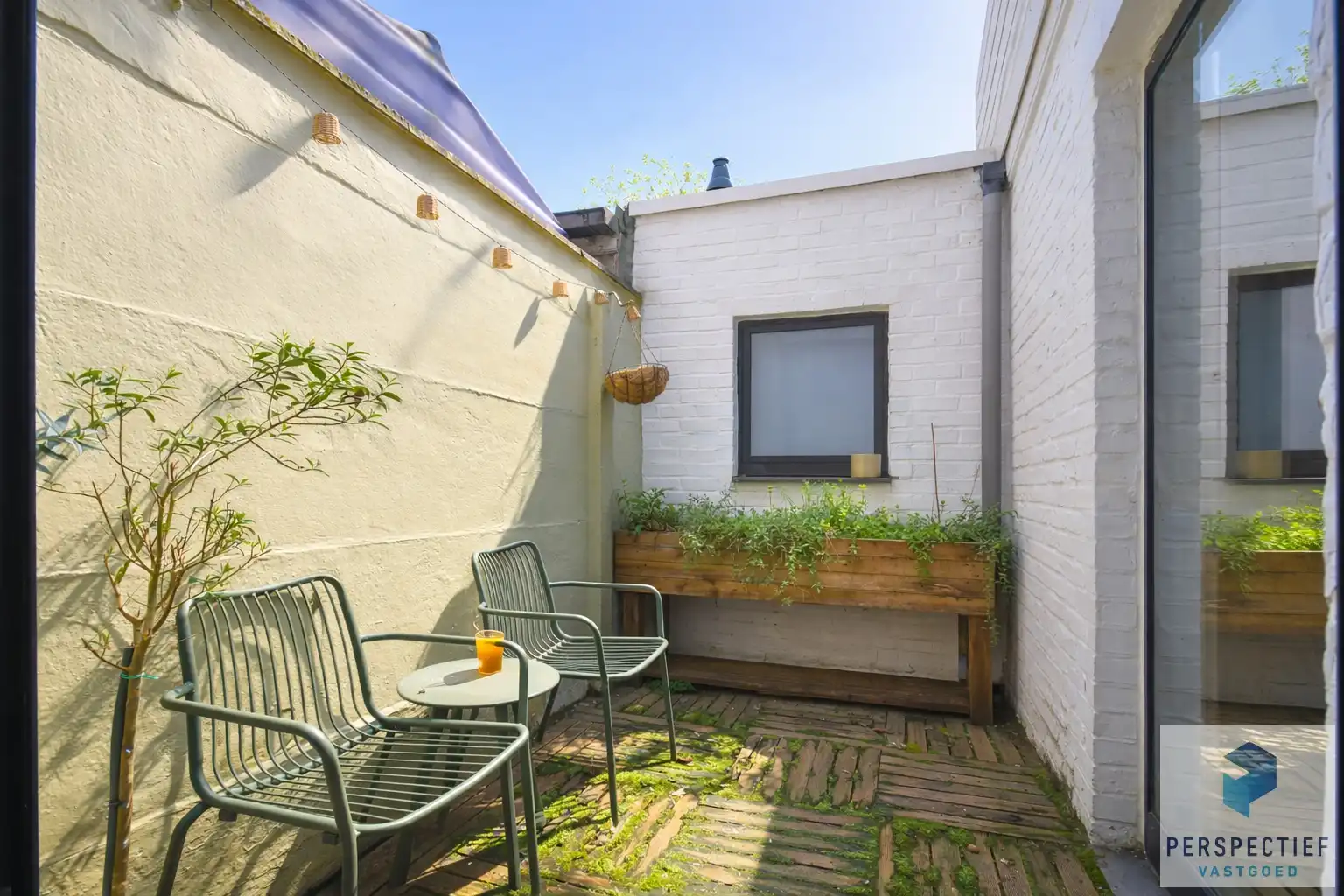 Mooie INSTAPKLARE stadswoning met 3 slpk en koer foto 3