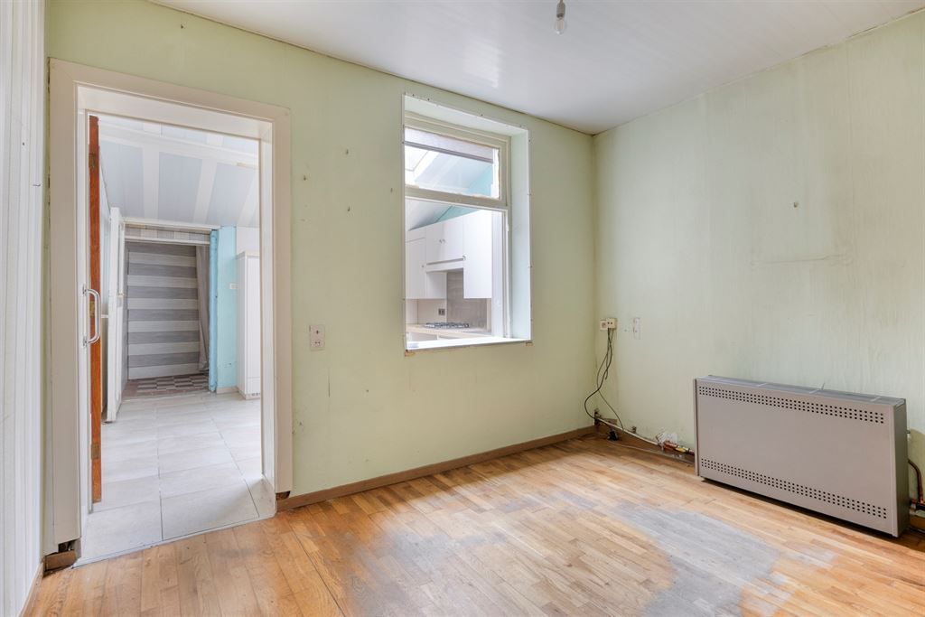 Halfopen woning met potentieel  foto 4